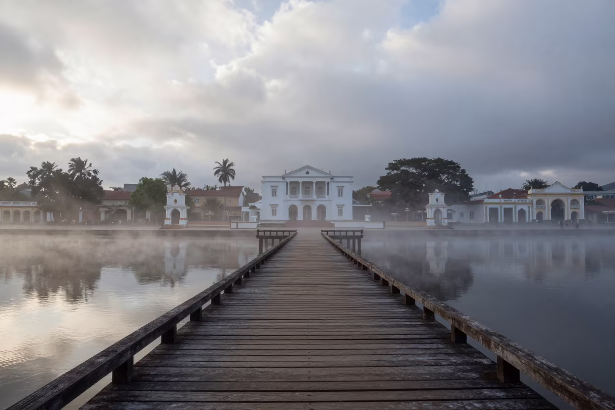 Wooden Pier Extending Into Mist Over Plaza in across a formal civic plaza near Coro