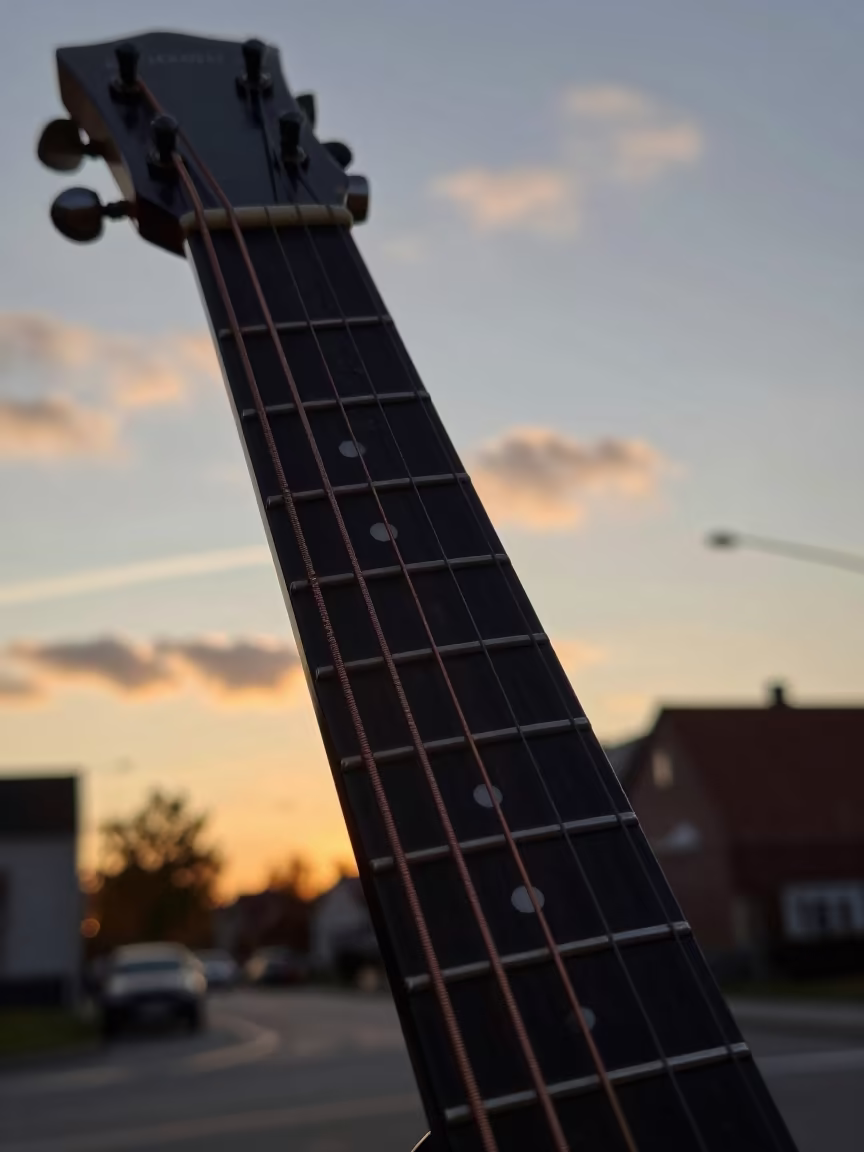 Wound Copper String Sunset Płock Street in at a street corner busking spot in Płock