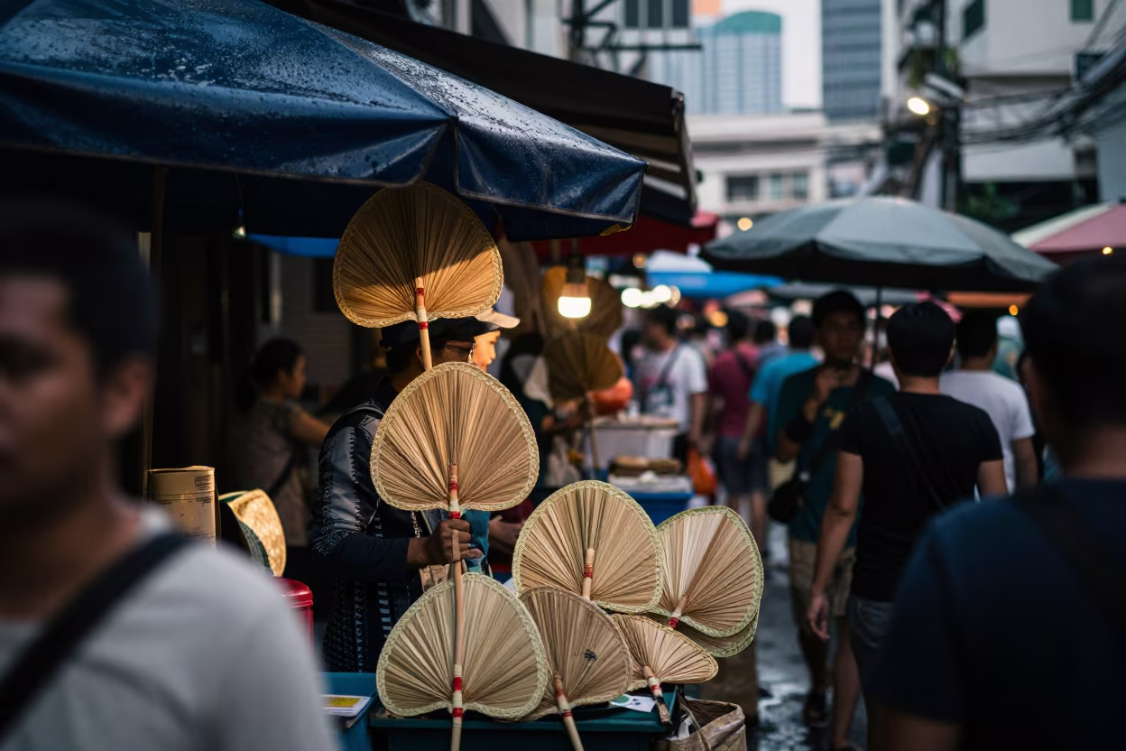 Woven Palm Fans at Silom Market Stall in under a market canopy in Silom, Bangkok
