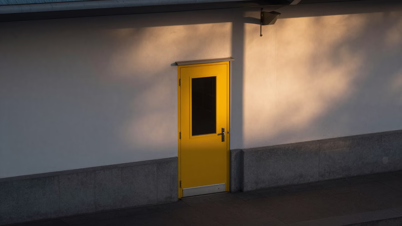 Yellow Door Grey Concrete Midnight Sun Oulu in inside a restored train terminal in Oulu