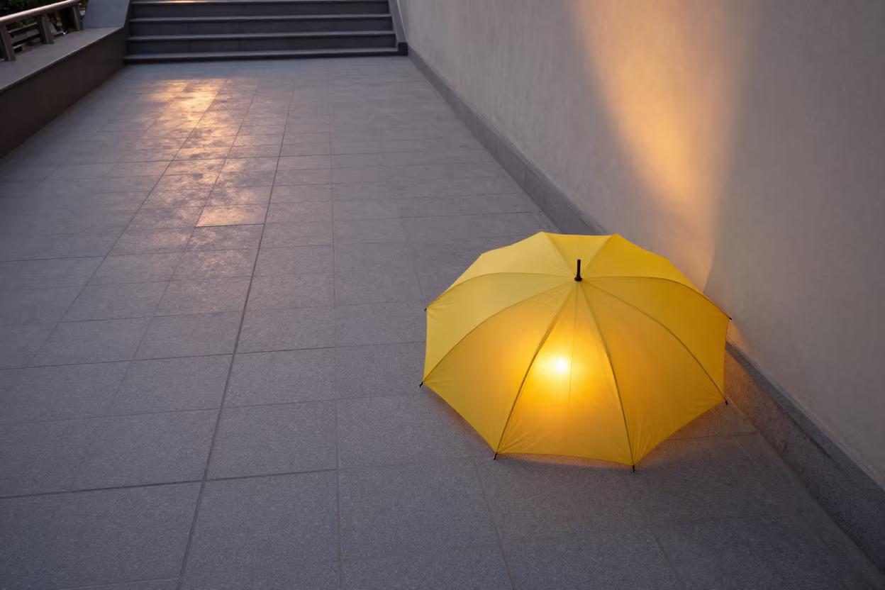 Yellow Umbrella Grey Tiled Hall Kandhkot in inside a tiled stair hall in Kandhkot