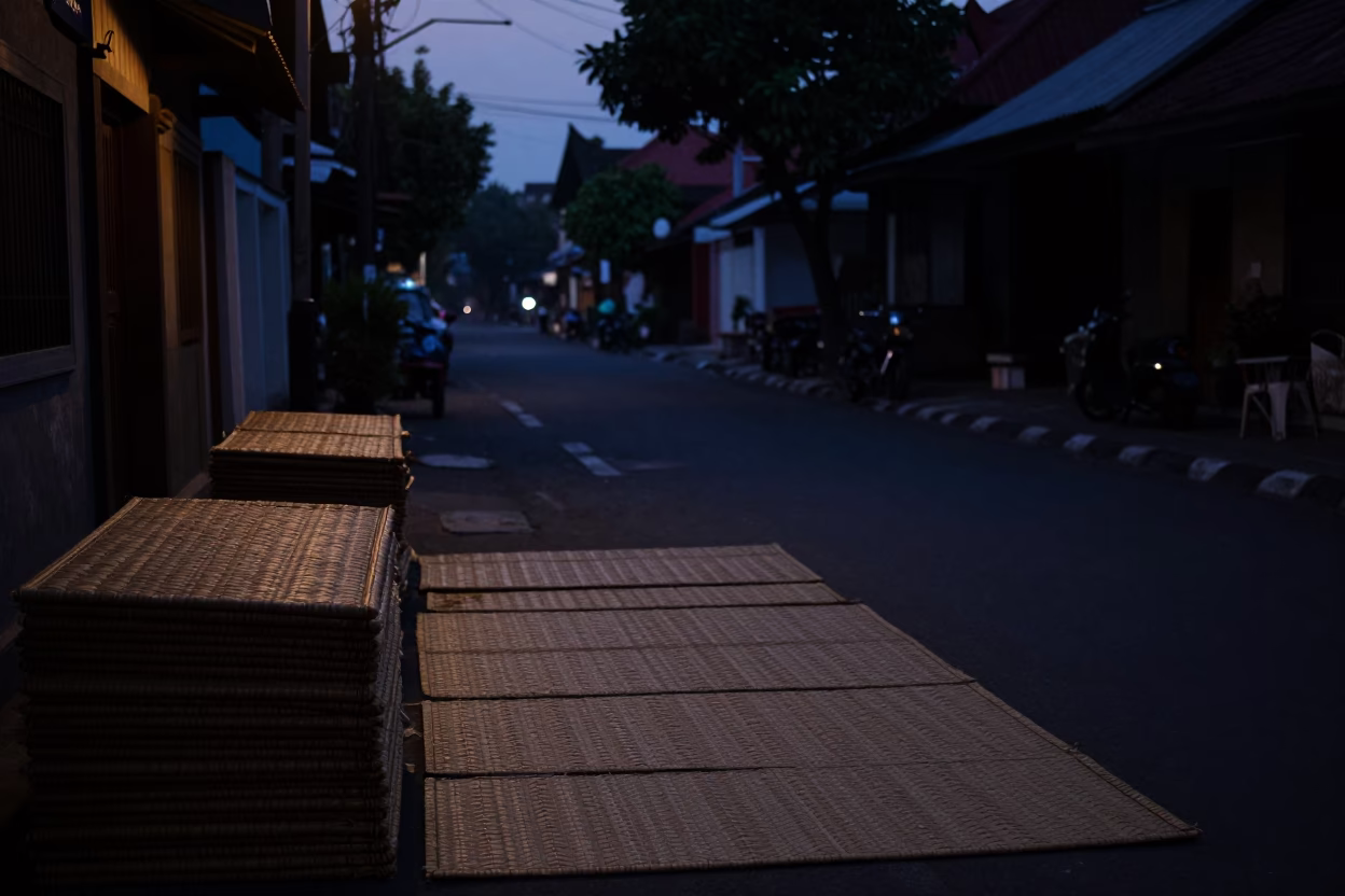 Yogyakarta Indonesia Predawn Street Scene with Woven Mats and Early Morning Market Activity in in Yogyakarta, Indonesia