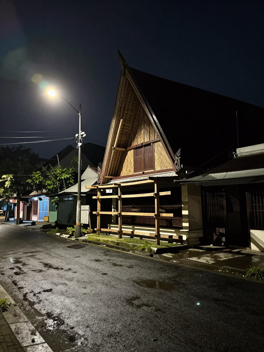 Yogyakarta Night Street Scene with Mason's Trowel and Wet Mortar on Scaffold in in Yogyakarta, Indonesia
