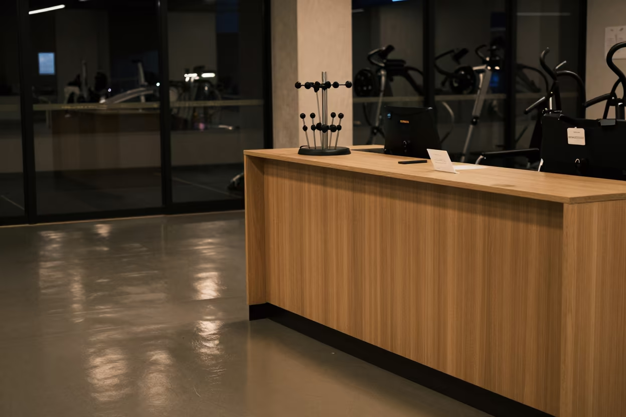 Yokohama Gym Desk Midnight Dowel Rack Reset in at a gym check-in desk in Yokohama