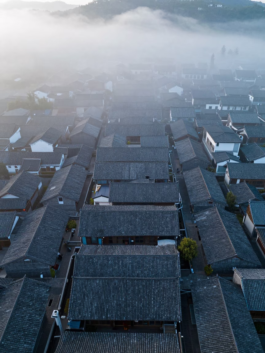Yunnan Rooftops Misty Dawn Aerial View in high above patterned rooftops in Yunnan