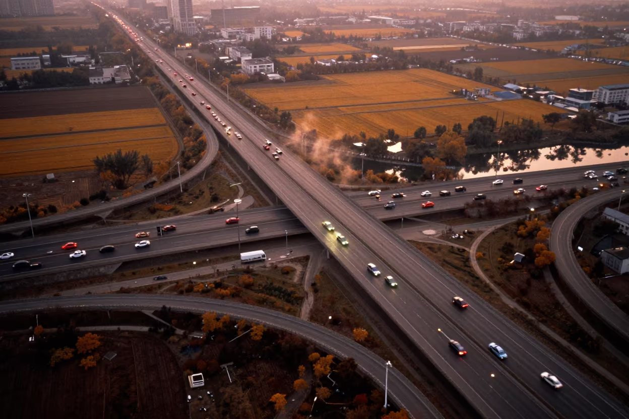 Zhengzhou Freeway Interchange Autumn Aerial in far above river meanders near Zhengzhou