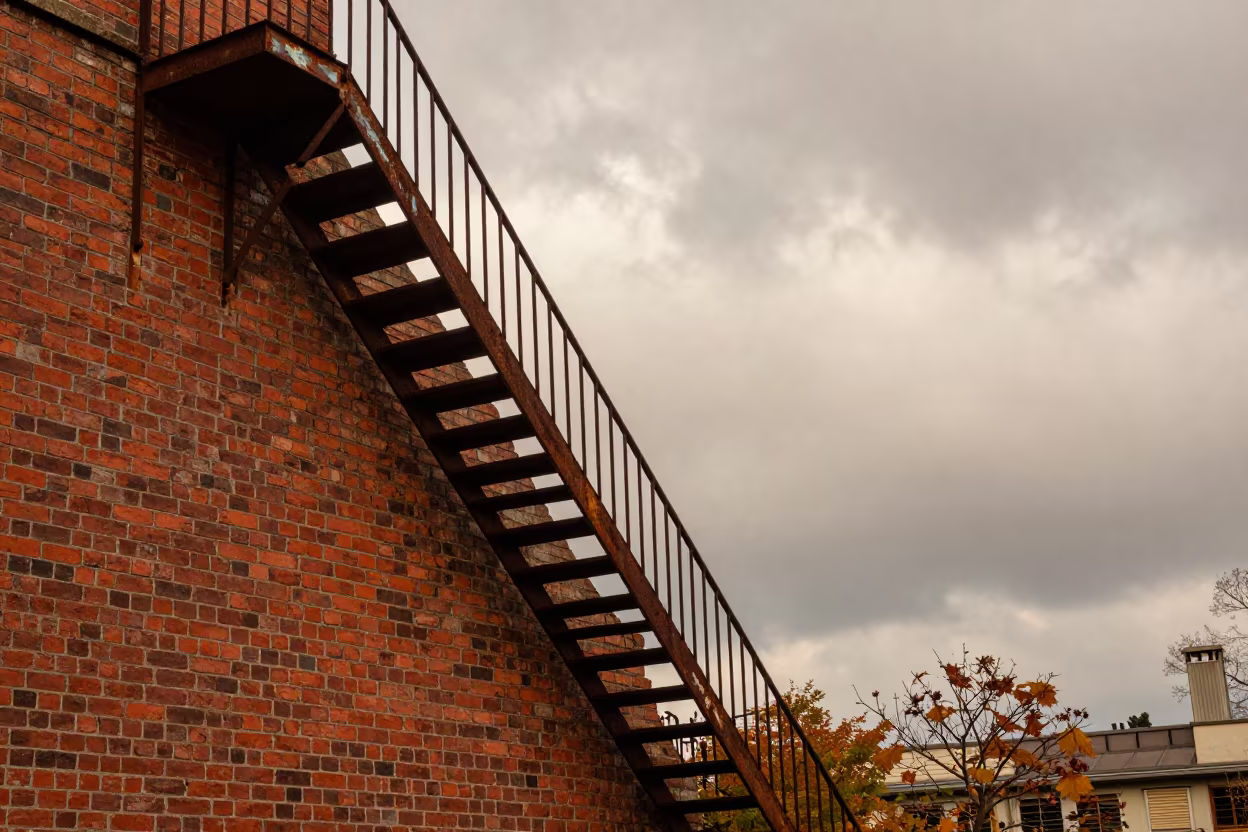 Zigzag Fire Escape on Bucharest Brick Staircase in at the base of a monumental staircase in Bucharest