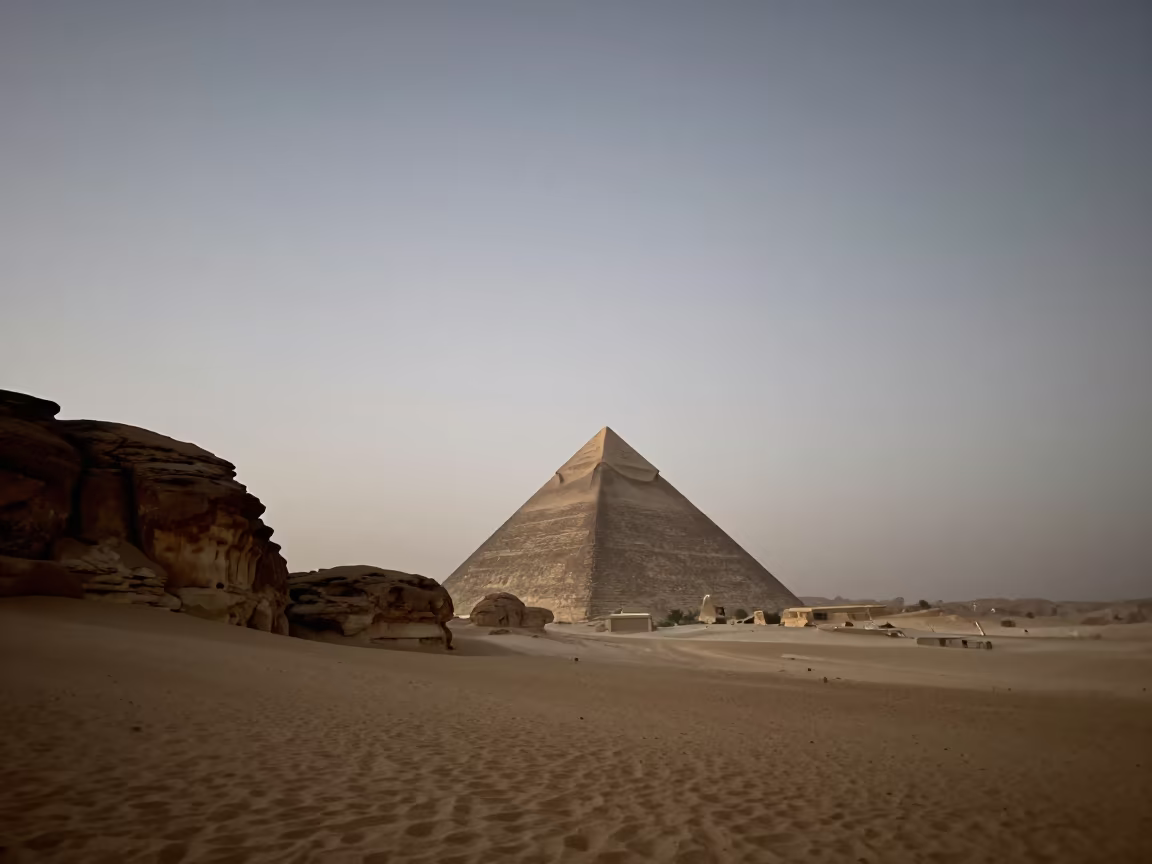 Zodiacal Light Pyramid Over Egyptian Desert Dawn in beneath a wind-cut desert escarpment in Egypt