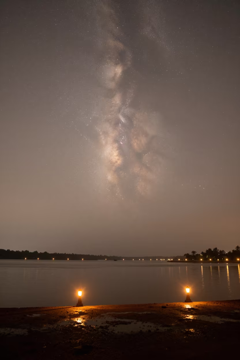 Zodiacal Light Pyramid Over Sri Lankan Harbor Night in beside a lantern-dotted harbor in Sri Lanka